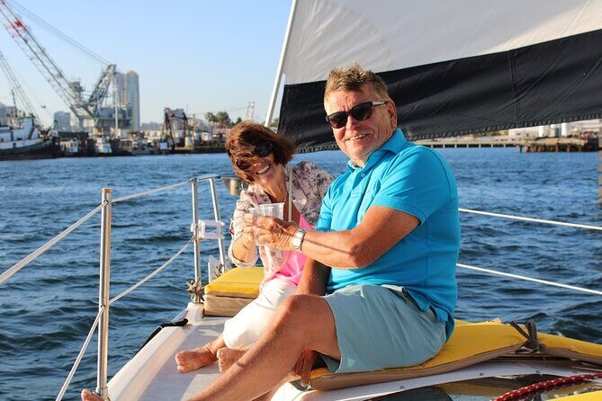 2.5 Hour Private Sunset Sailing Tour in San Diego up to 12 guests - Sailing close between the US Midway and the Kissing statue