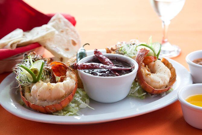 Tour of San Diego>Rosarito >Giant Christ>Puerto Nuevo Lobster - Where you start: Las Americas Premium Outlets to Mexico